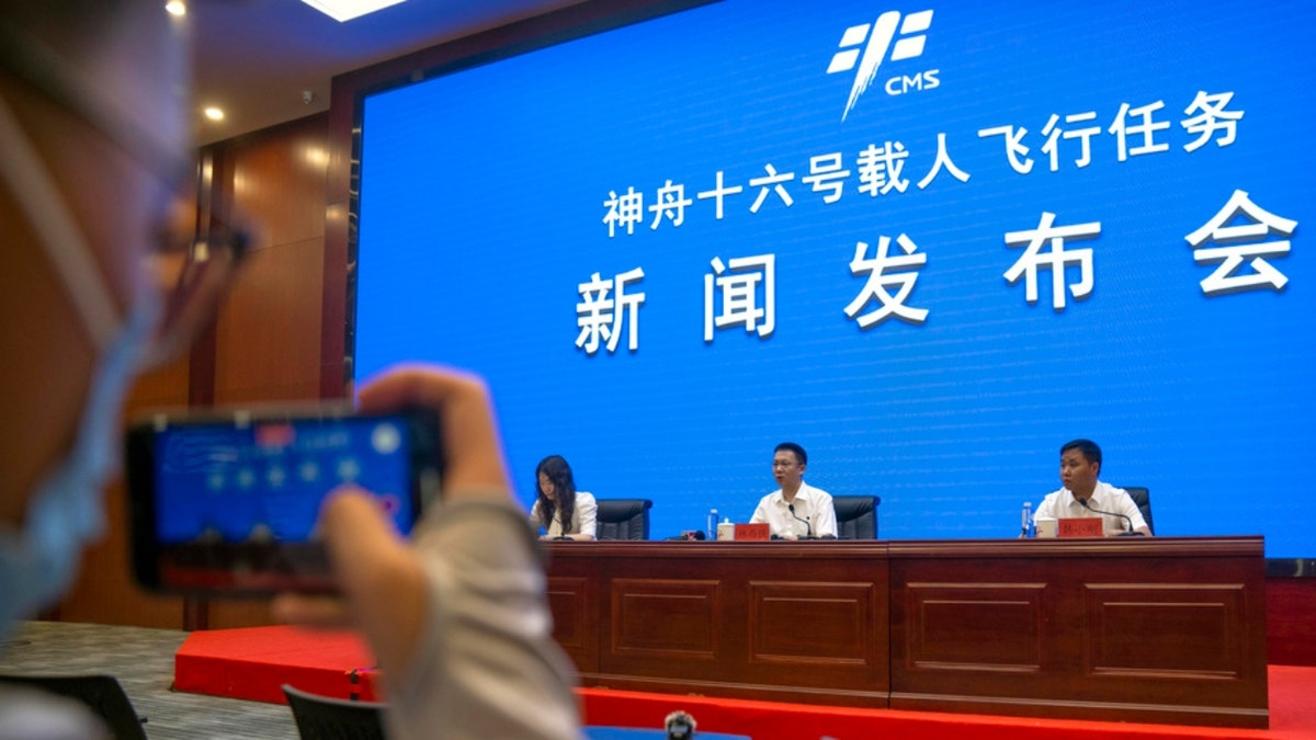 A press conference at the Jiuquan Satellite Launch Center