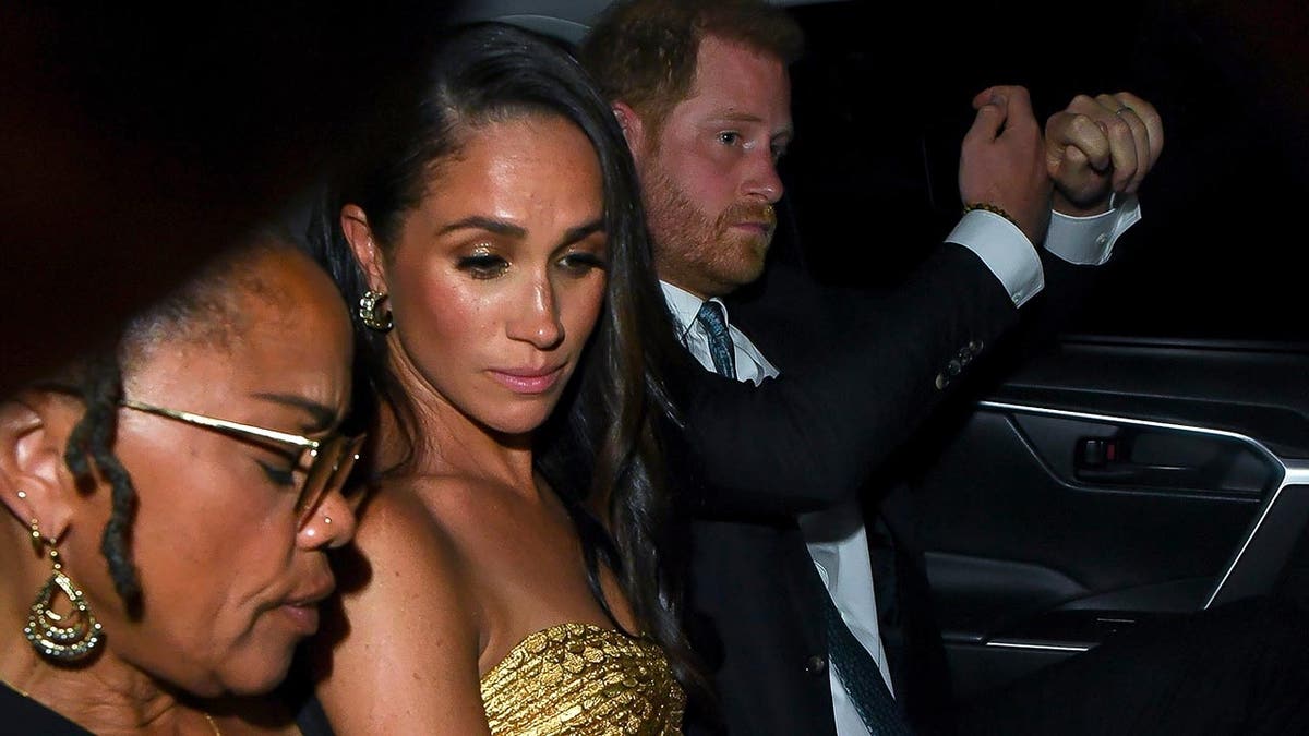 Meghan Markle, Prince Harry and Doria Ragland sit in the back of a New York City taxi cab
