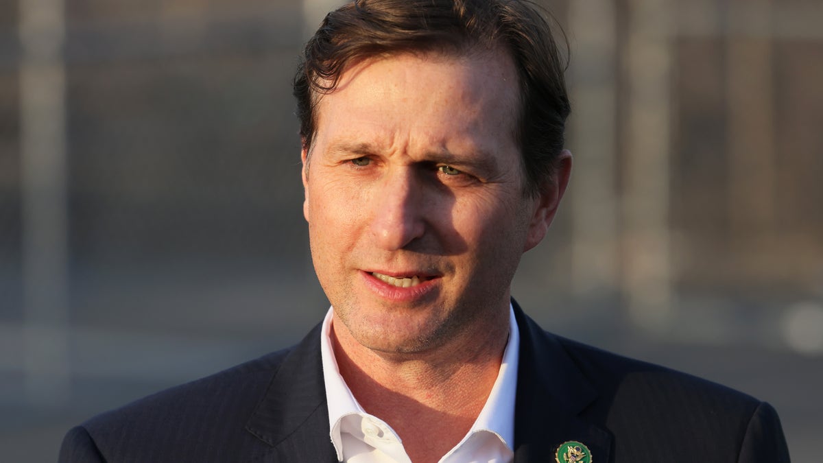 Rep. Dan Goldman, D-N.Y., speaks during a press conference at the entrance of the migrant relief center at Brooklyn Cruise Terminal on Feb. 2, 2023 in New York City.