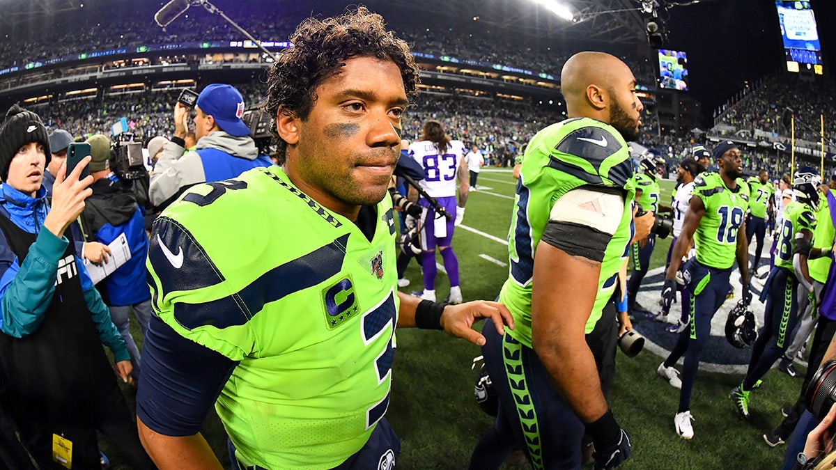 Russell Wilson and KJ Wright after a game