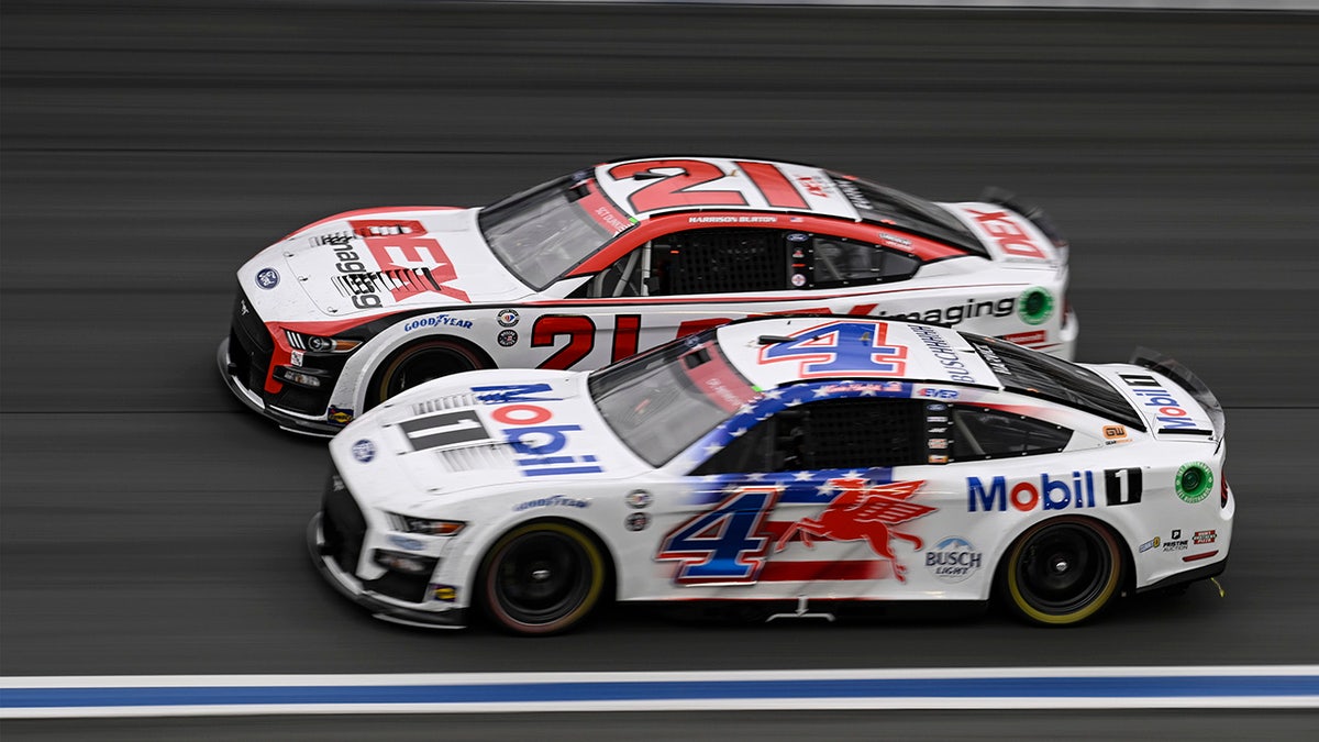 Kevin Harvick vies for position