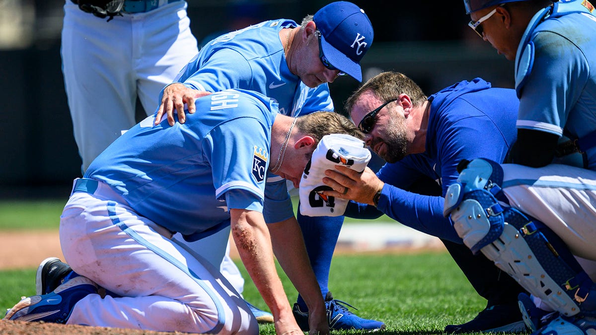 Ryan Yarbrough helped up