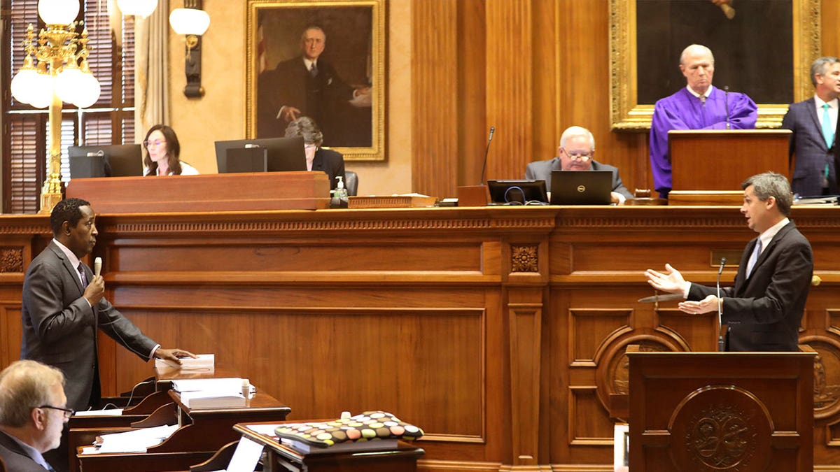 South Carolina Sen. Darrell Jackson, left, asks questions about a bill detailing how certain topics are taught and how parents can file complaints in state schools on May 2, 2023, in Columbia. After Republicans said they don’t believe a proposed hate crimes bill will solve the problem of hate, Jackson said the uncertainty over a bill’s impact hasn’t stopped the Senate from voting before. 