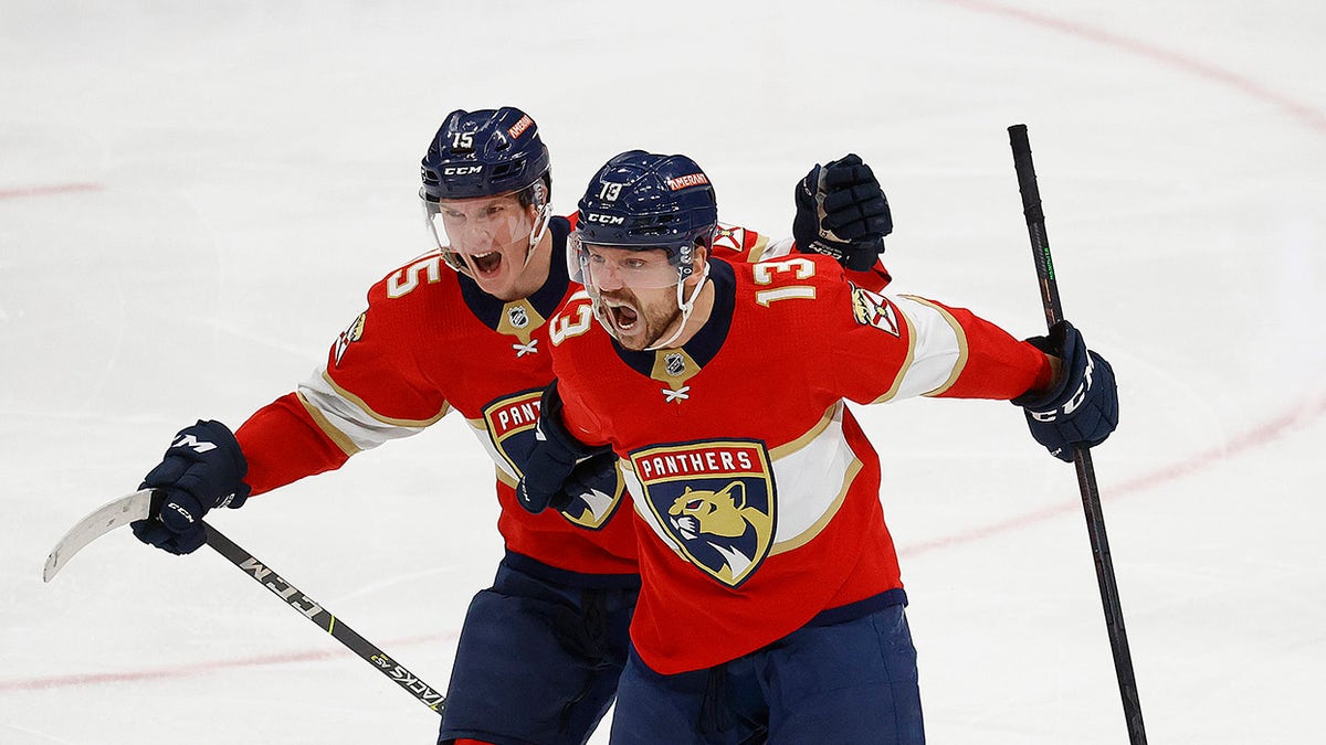 Sam Reinhart, #13 of the Florida Panthers, celebrates his game winning goal with teammate Anton Lundell, #15, in overtime against the Toronto Maple Leafs in Game Three of the Second Round of the 2023 Stanley Cup Playoffs at the FLA Live Arena on May 7, 2023 in Sunrise, Florida.
