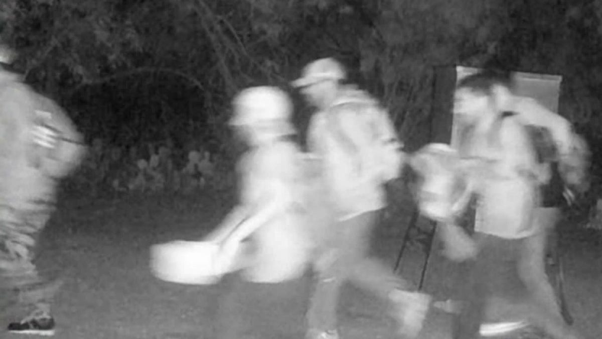 Migrants cross the Canales' property in the early morning. (Screengrab/ Fox News Tonight)