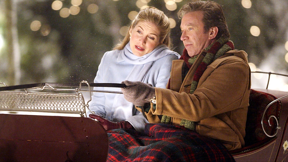 Tim Allen and Elizabeth Mitchell filming a scene for "The Santa Clause 2."