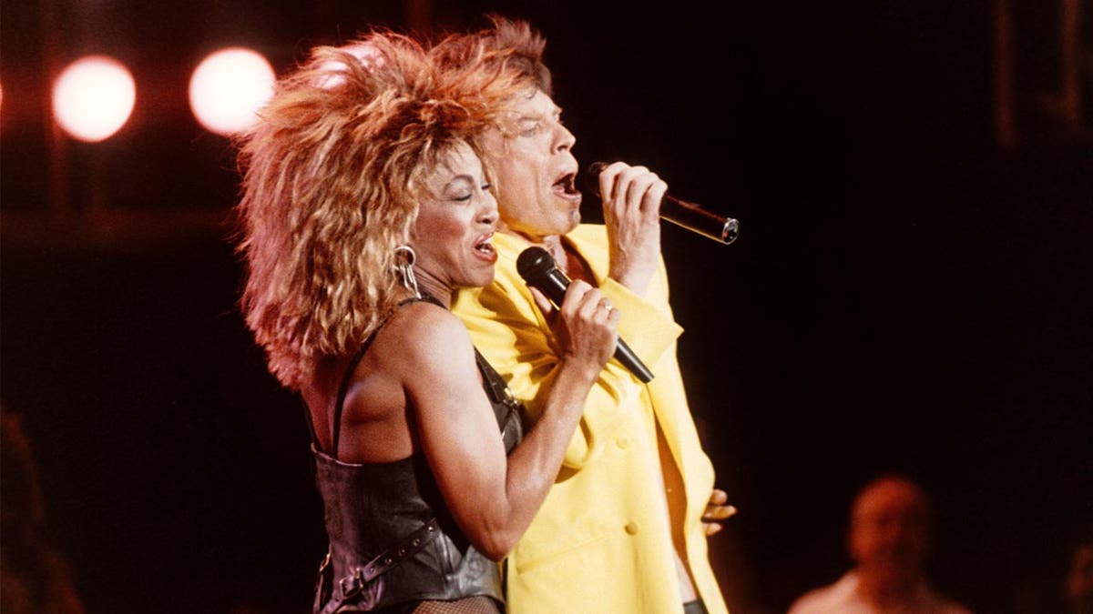 Mick Jagger, and Tina Turner on stage together