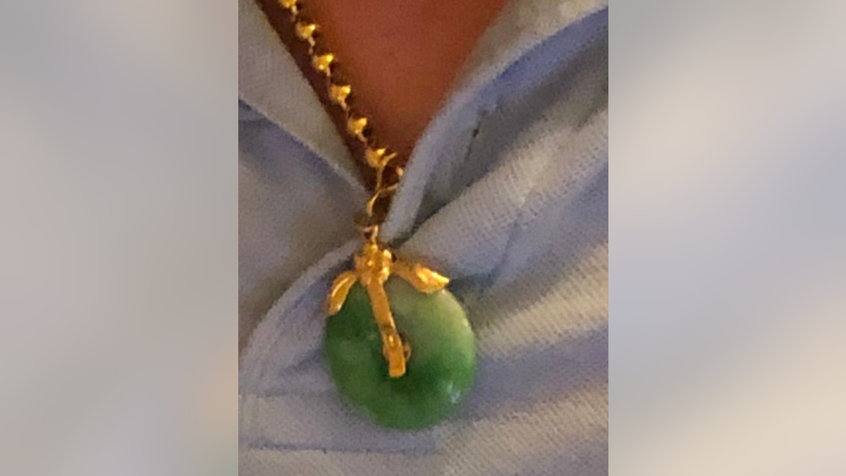 Victim's jade pedant necklace