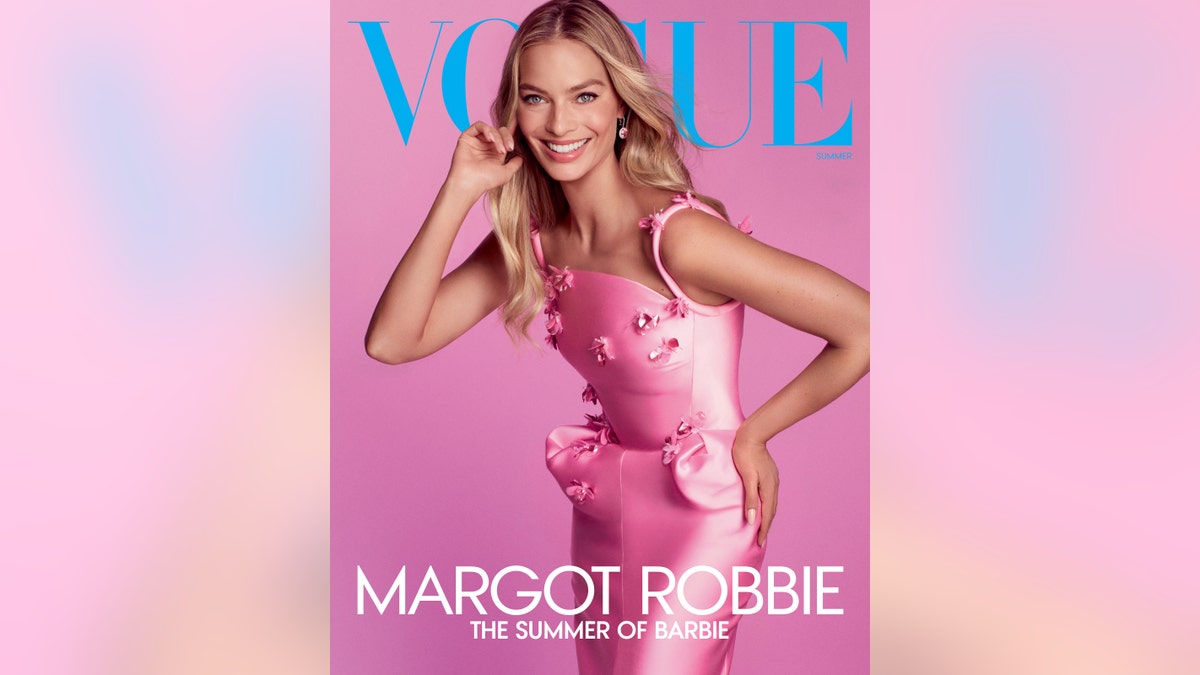 Margot Robbie in pink dress on the cover of Vogue