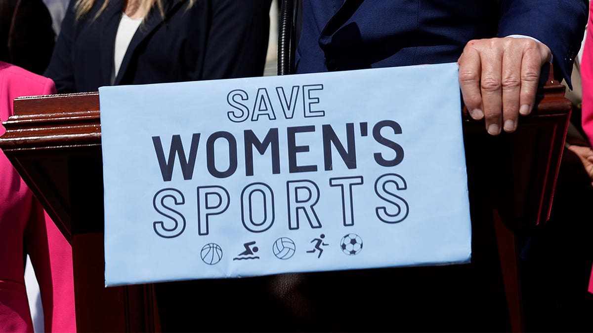Save Womens Sports sign