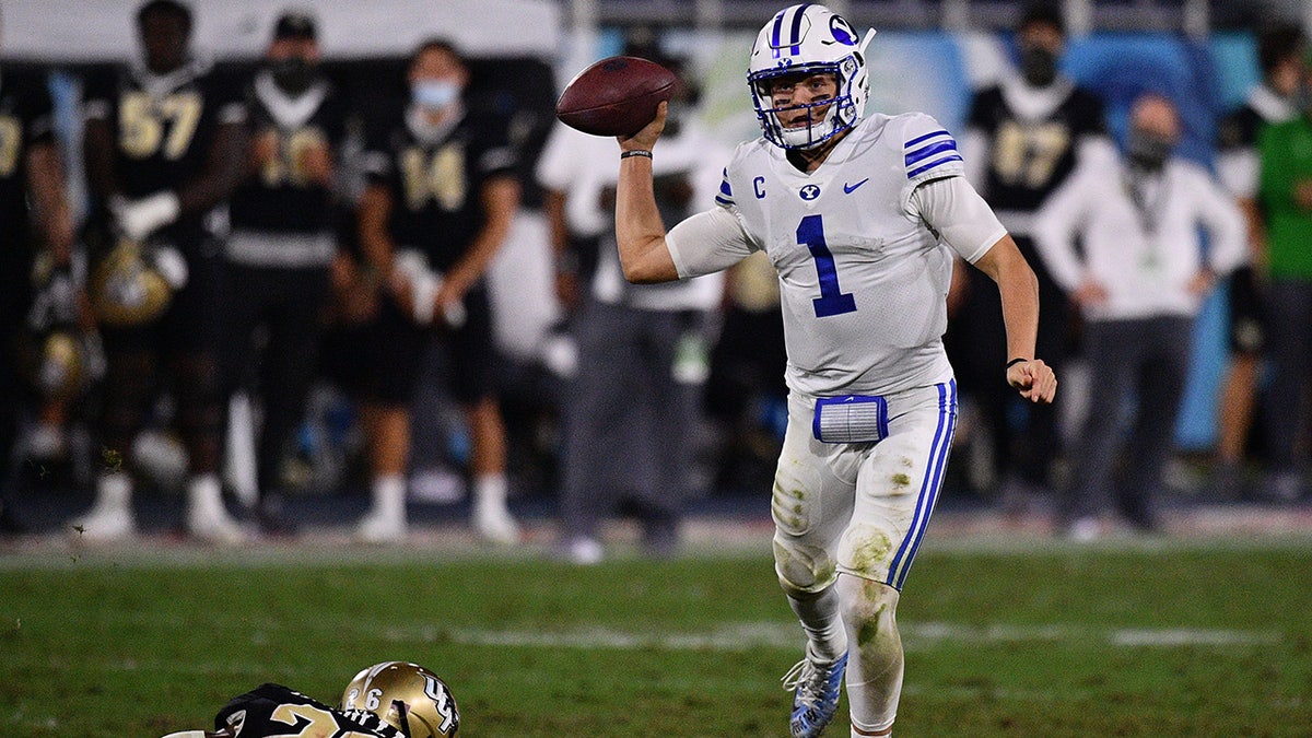 Zach Wilson passes during a BYU Cougars game