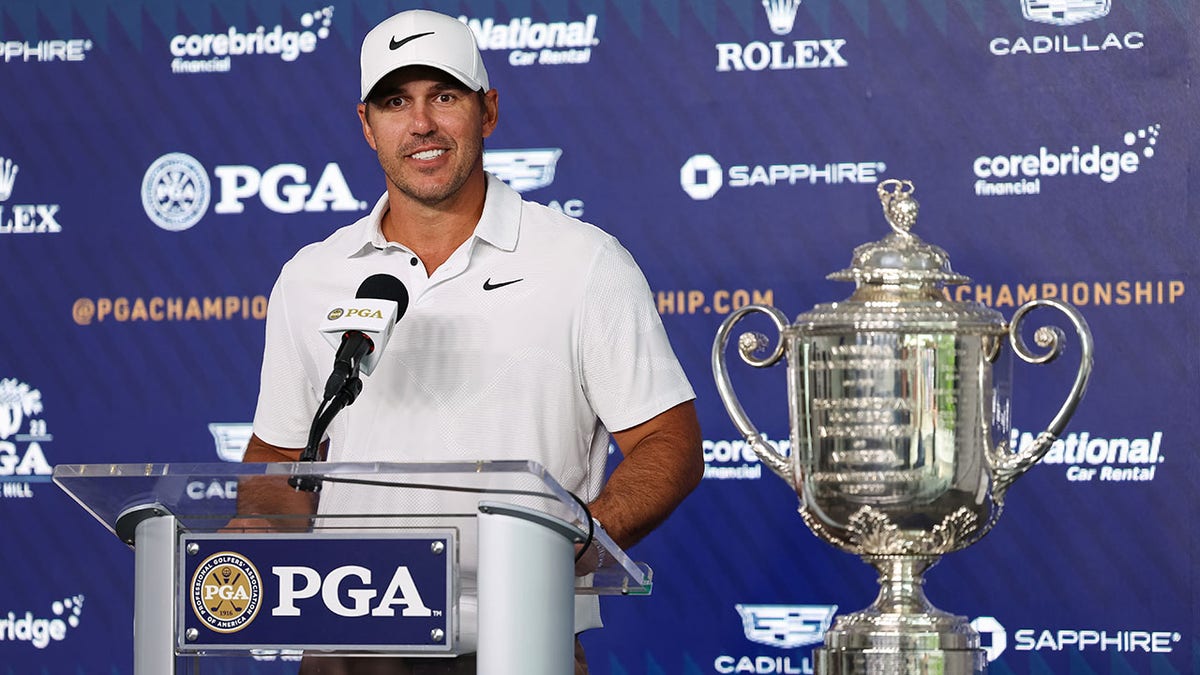 Brooks Koepka with the trophy