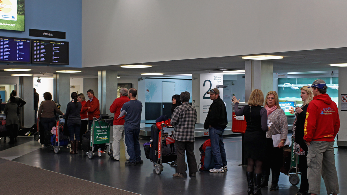 line of passengers at Auckland Airport