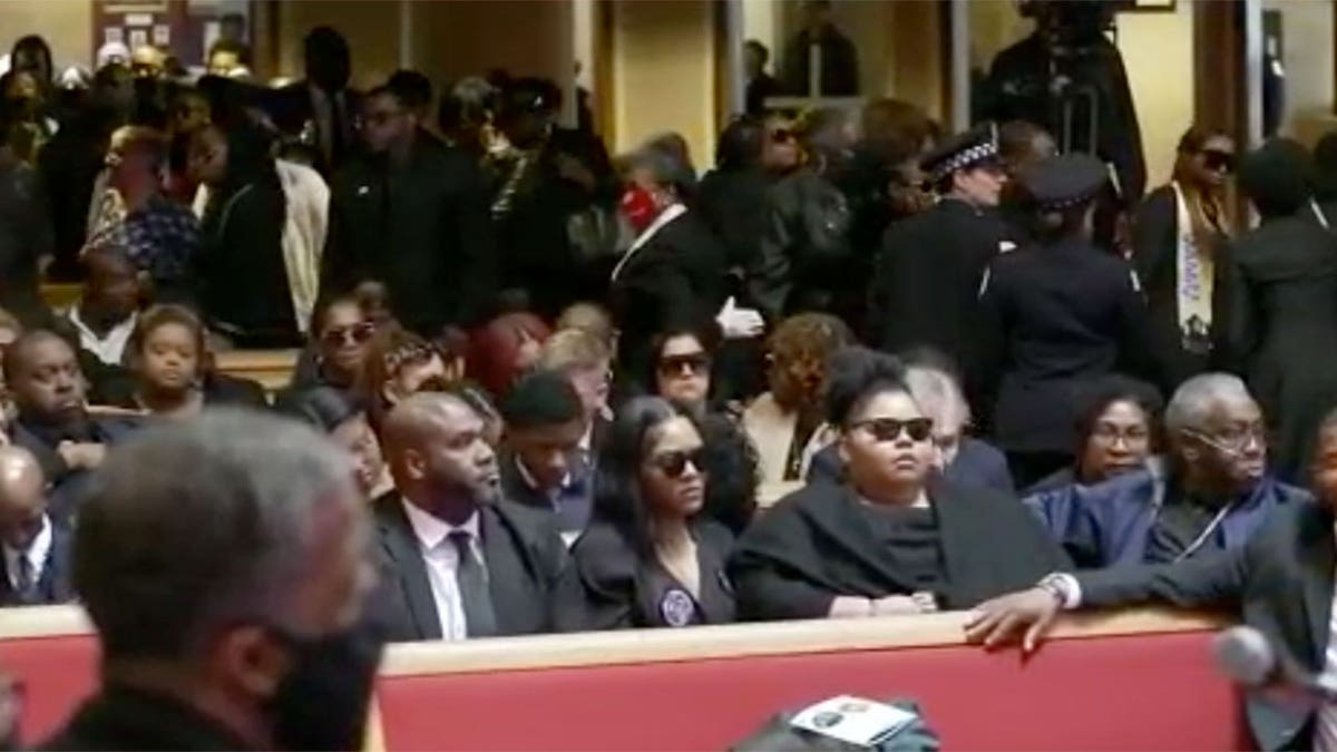 Mourners and police officers attend Areanah Preston's funeral