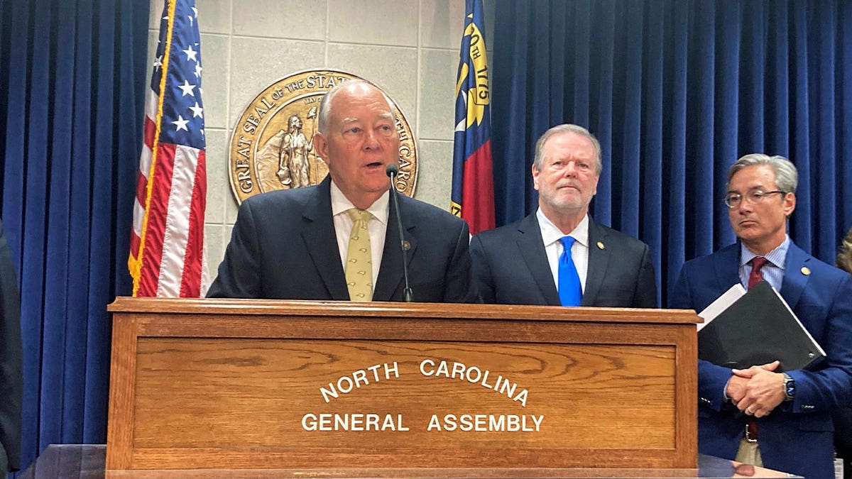 North Carolina state Sen. Brent Jackson, left, speaks on May 15, 2023, in Raleigh. Senate Republicans unveiled a two-year state government budget proposal which received initial approval in the chamber.