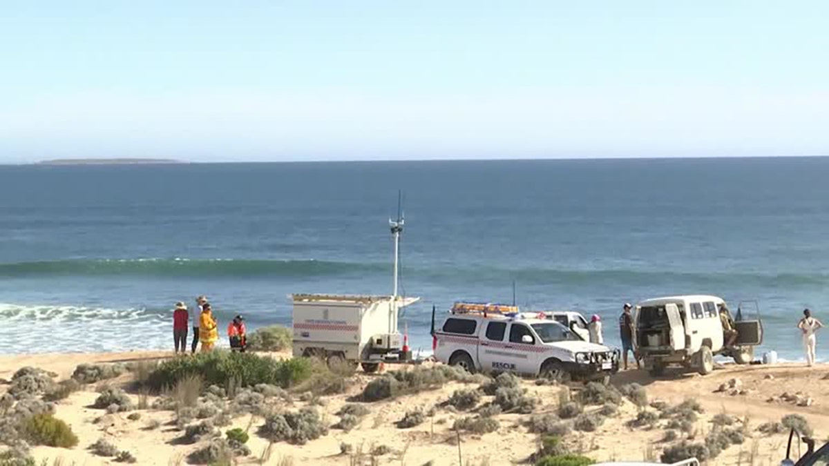 Searchers looking for missing surfer