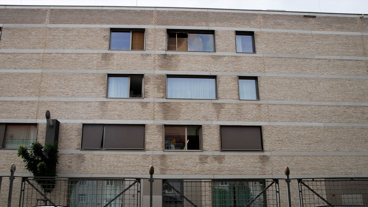 Destroyed windows are seen on a building of the State Cinic in Moedling, near Vienna, Austria, on May 30, 2023, after a fire broke out in the hospital that led to the loss of three lives. 