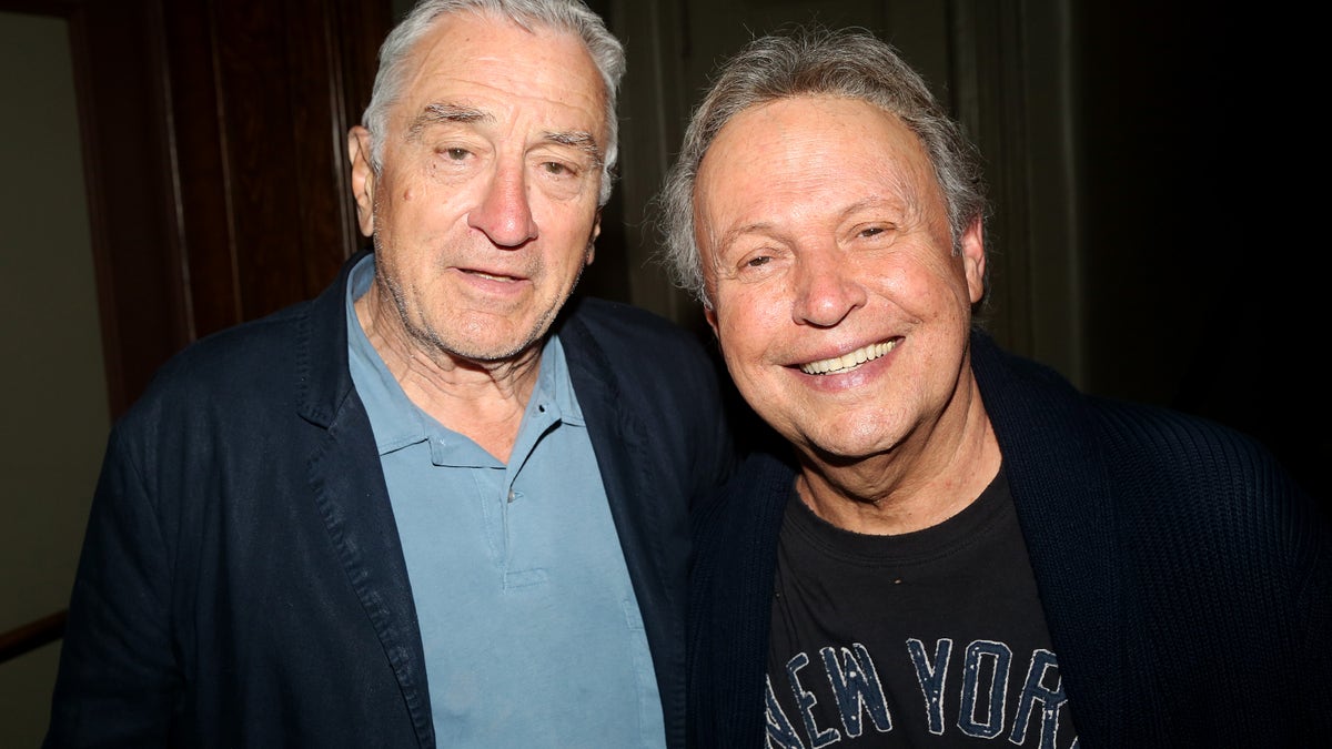 Robert De Niro poses for a photo with friend and former costar Billy Crystal.