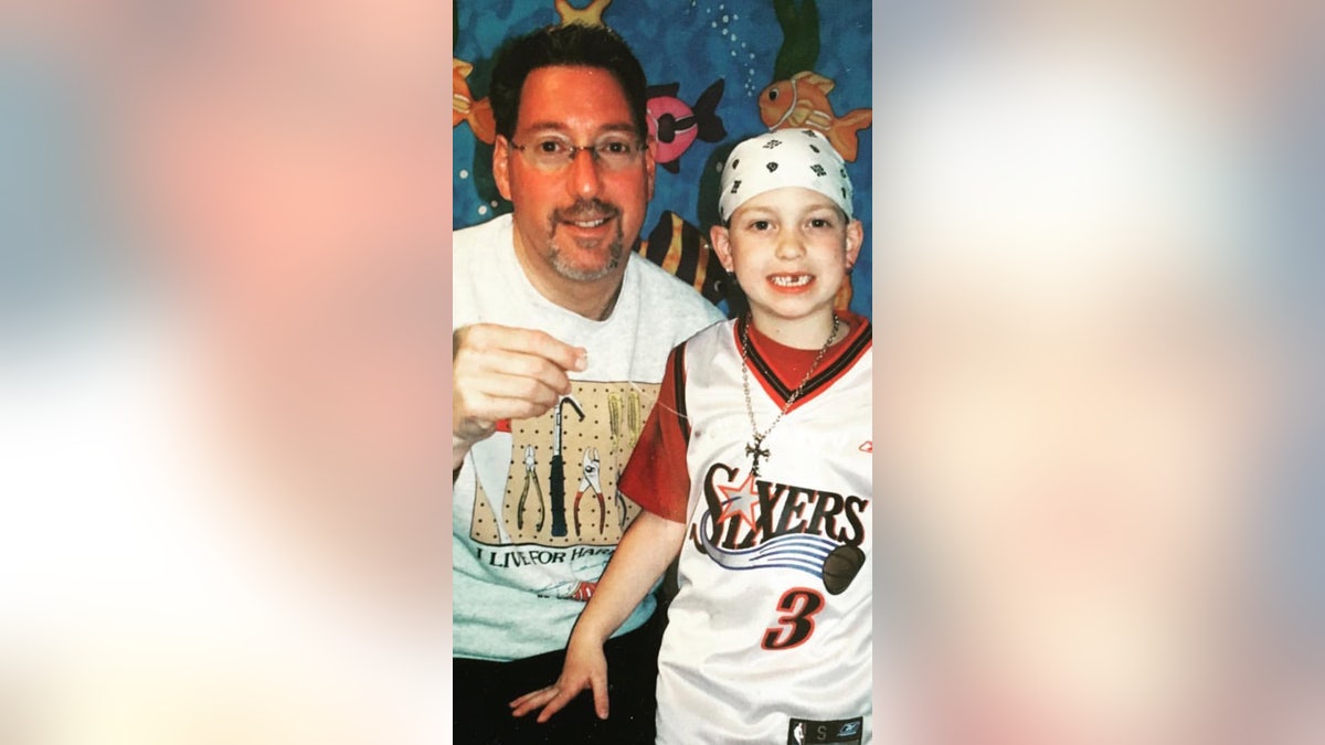 Lewis' father died from brain cancer when he was just 10-years-old.