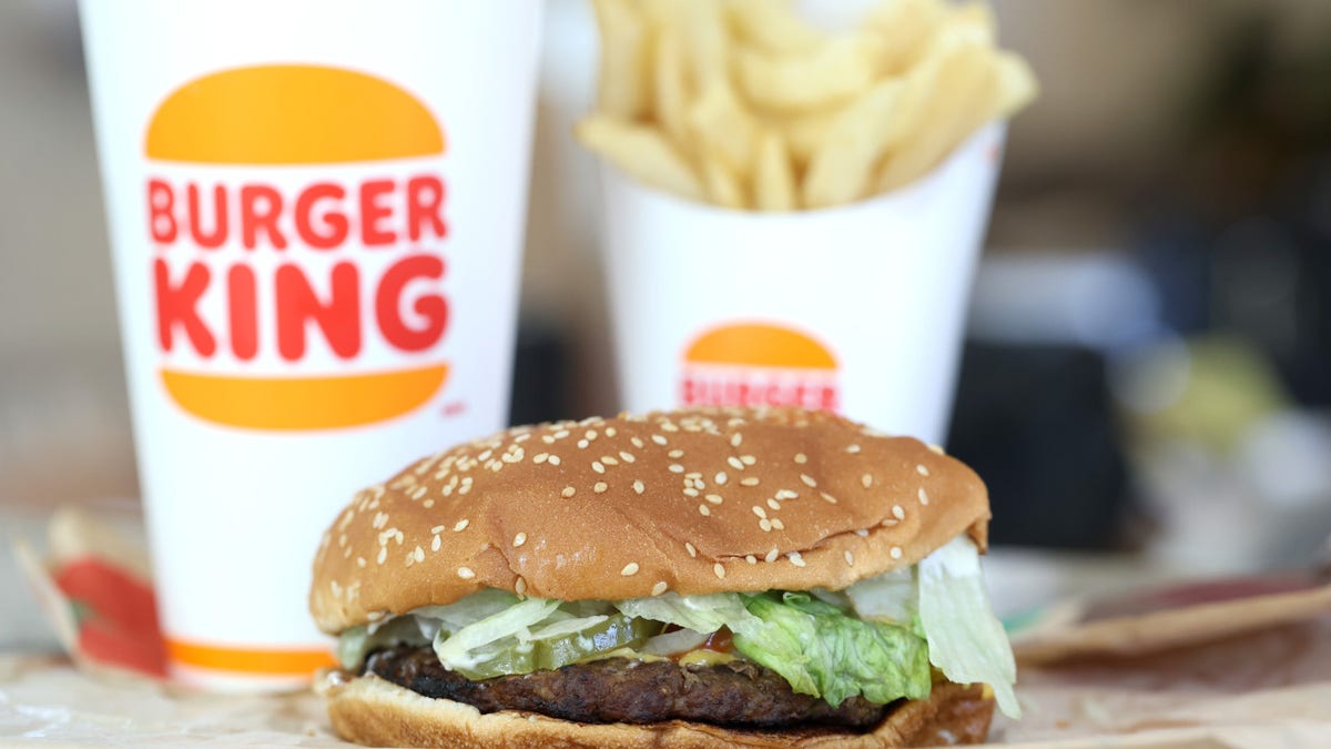 SAN ANSELMO, CALIFORNIA - APRIL 05: In this photo illustration, a Burger King Whopper hamburger is displayed on April 05, 2022 in San Anselmo, California.(Photo Illustration by Justin Sullivan/Getty Images)