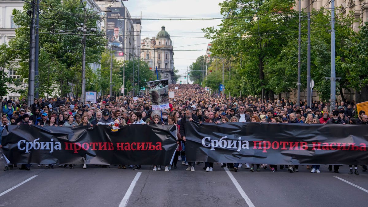 Serbs marching on Belgrade in protest of the Balkan nation's right-wing, authoritarian government following two mass shootings, were met with a counter-demonstration by allies of President Aleksandar Vucic.