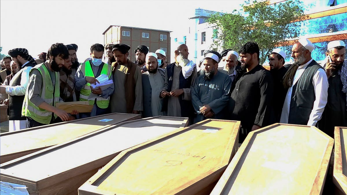 afghan migrants in coffins