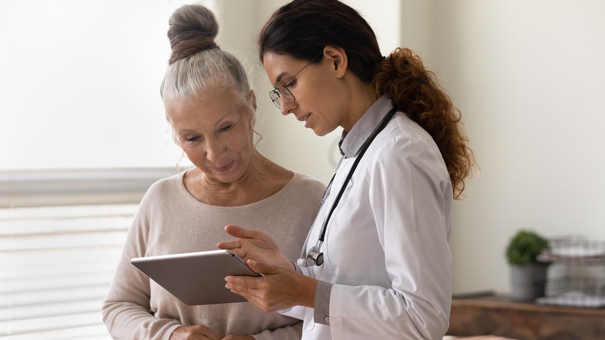 Doctor with patient