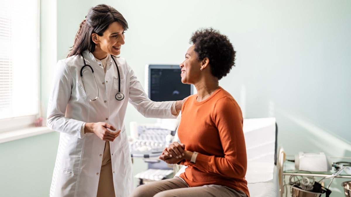 Doctor with patient