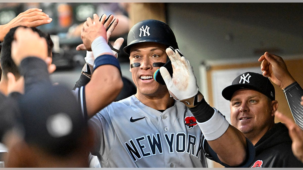 Aaron Judge celebrates with teammates