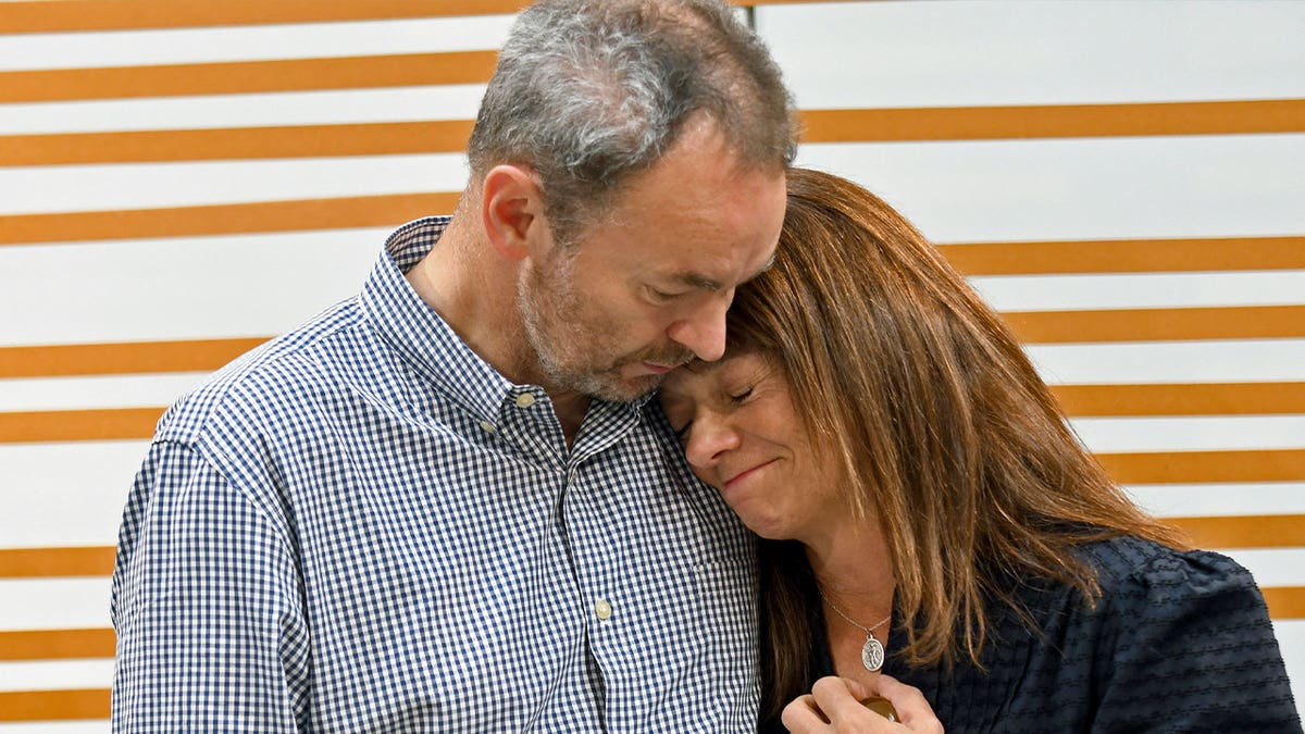 family hugging in Denver