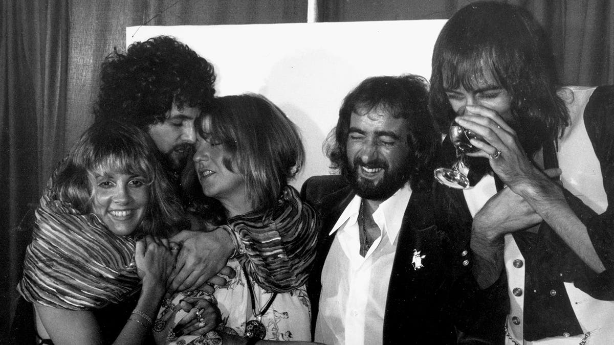 Fleetwood Mac bandmembers backstage at the LA Rock Awards in 1977