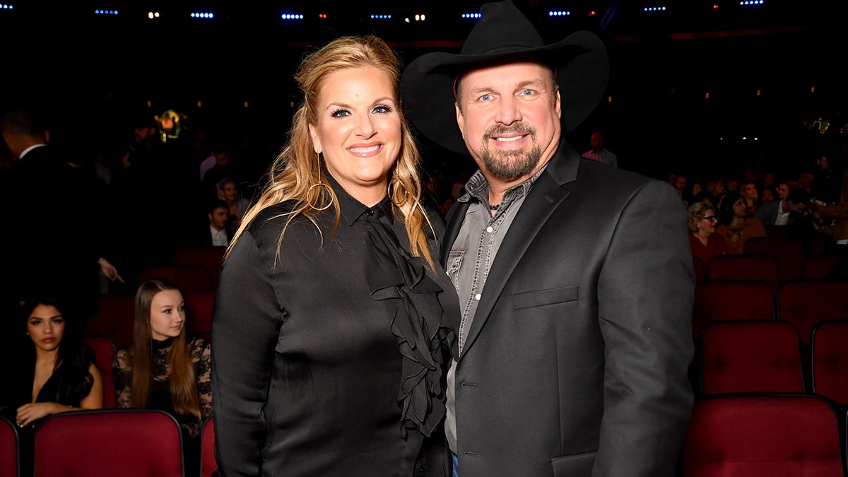 Garth Brooks with Trisha Yearwood at an event