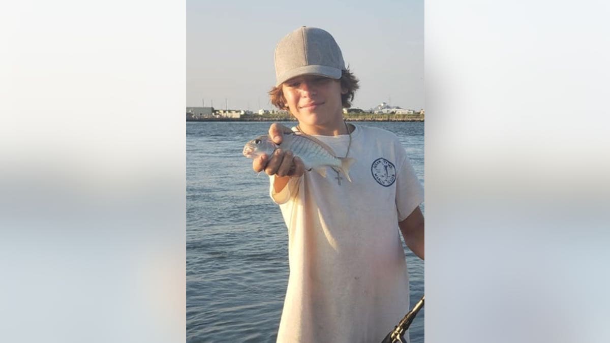 Gavin Knuppe holding fish
