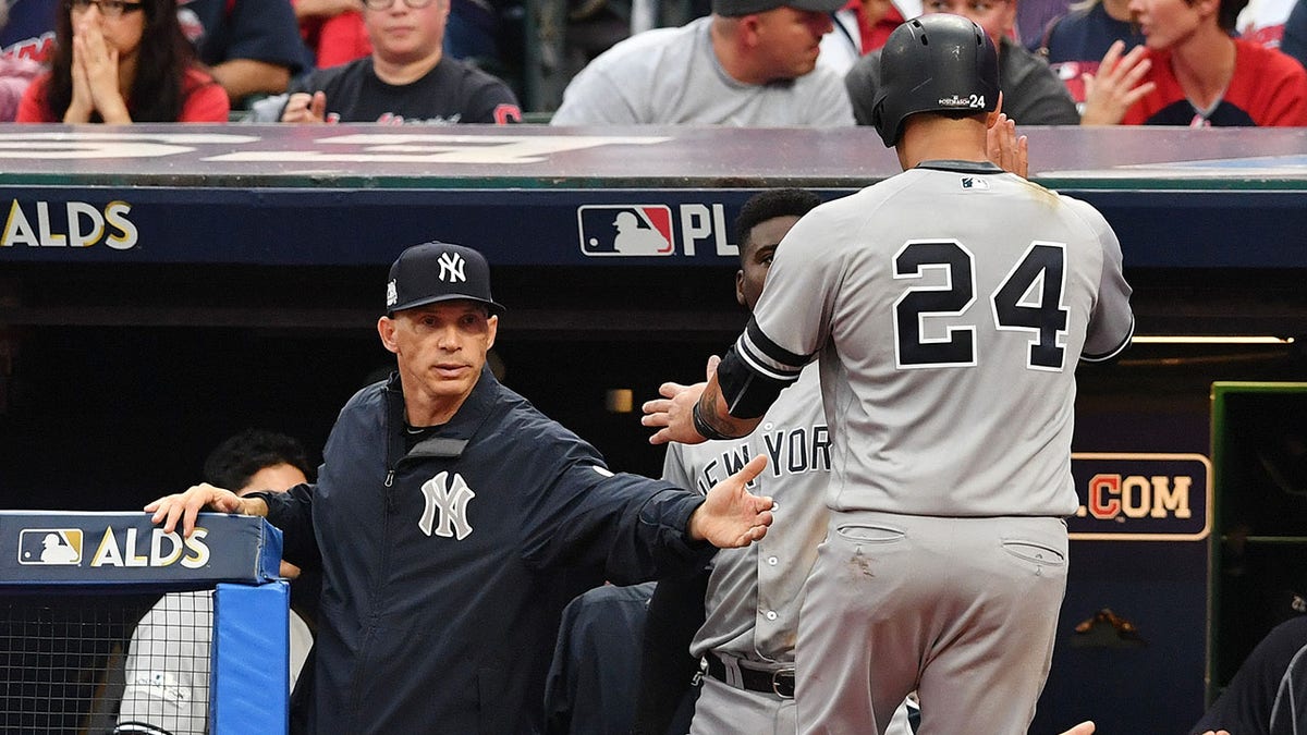 Gary Sanchez high fives Joe Girardi