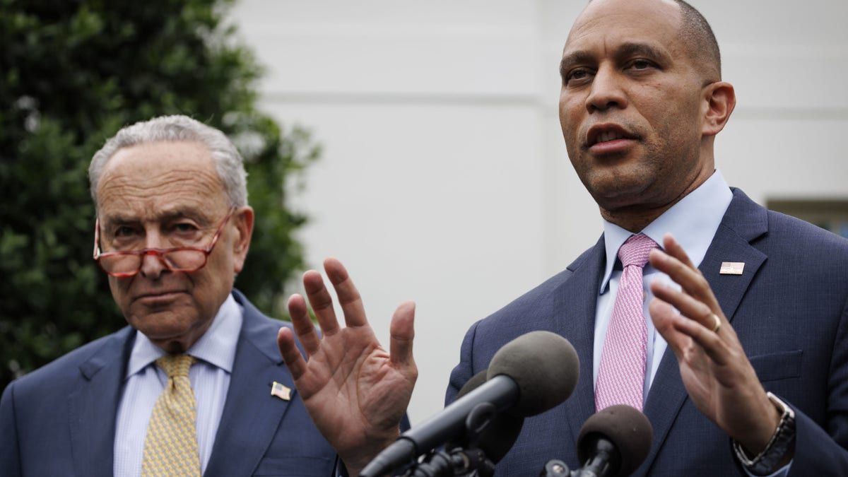 Democratic congressional leaders Hakeem Jeffries and Chuck Schumer speak to the media