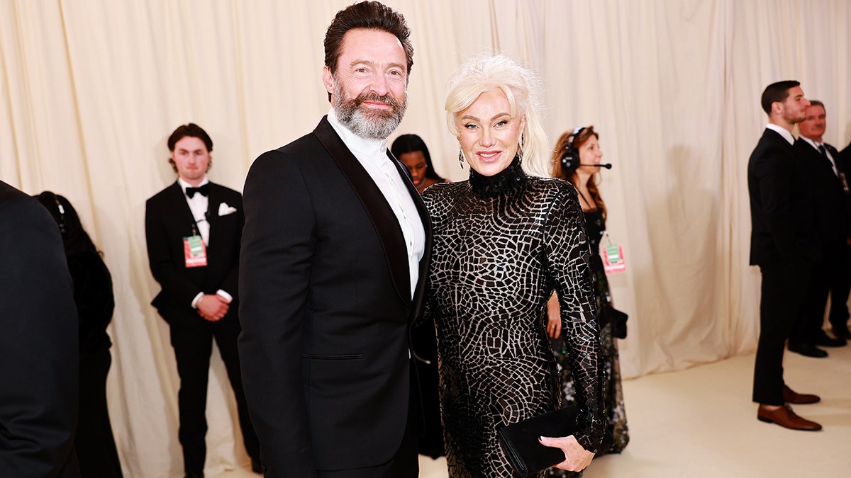 Hugh Jackman shows off beard while wife Deborra-Lee rocks skin-tight black gown at Met Gala