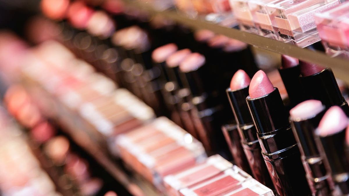 Lipstick testers displayed in a store.