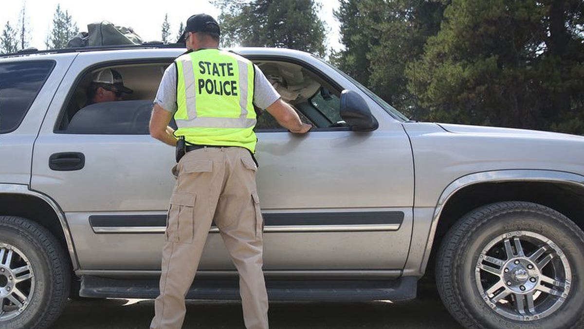 State police outside a vehicle