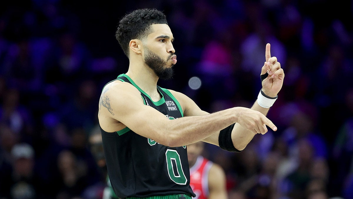 Jayson Tatum celebrates