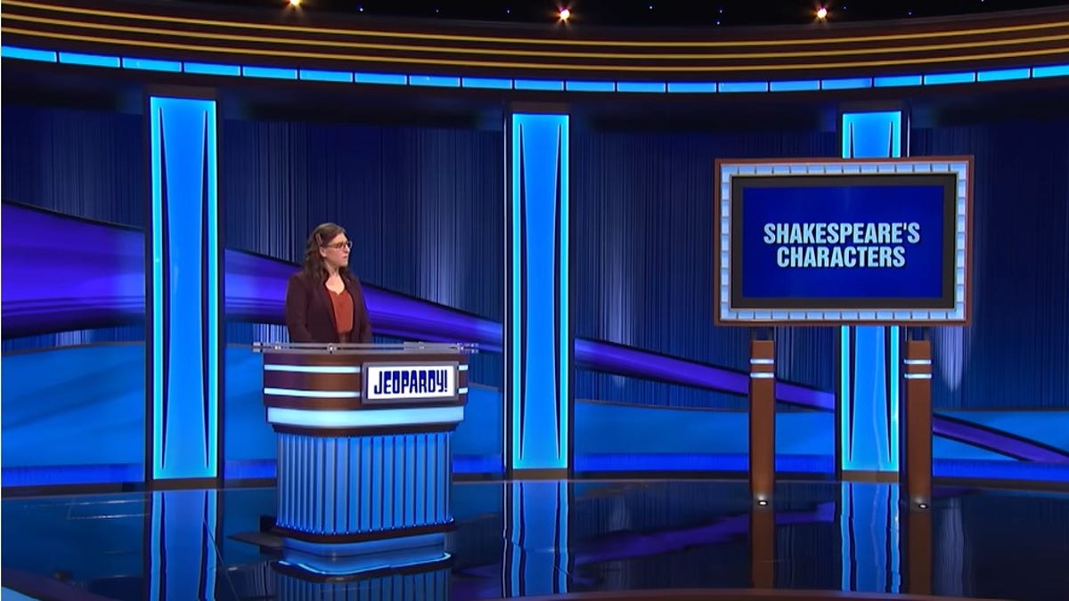 Mayim Bialik at the podium on Jeopardy for the final category
