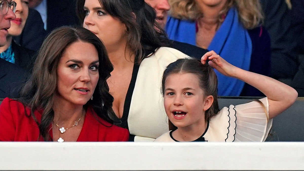 Princess Charlotte scratches her head during coronation concert with Princess of Wales