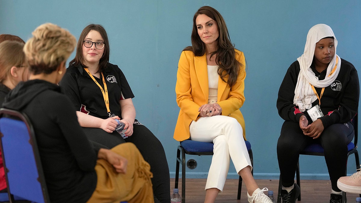 Kate Middleton listening to teens in Bath, England