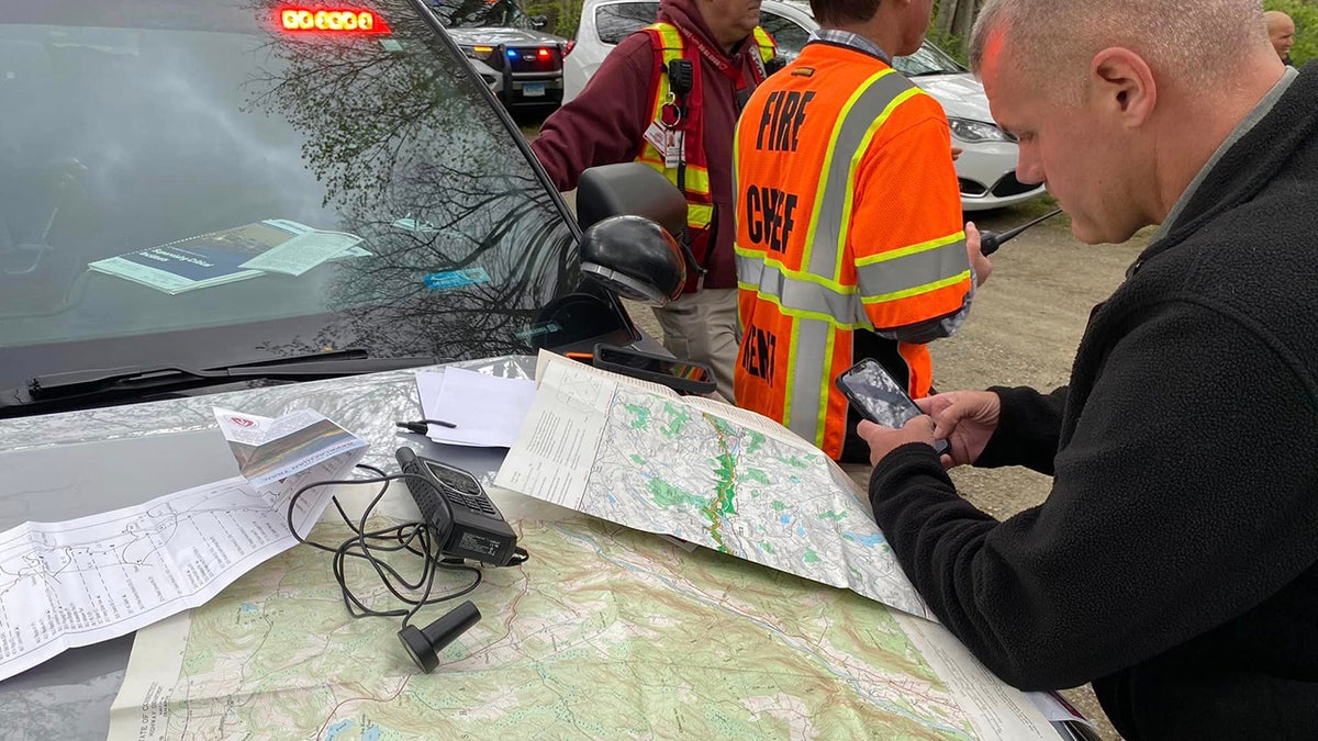 search crew and map of area