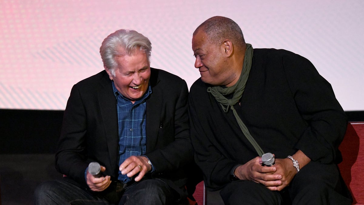 Laurence Fishburne and Martin Sheen laughing