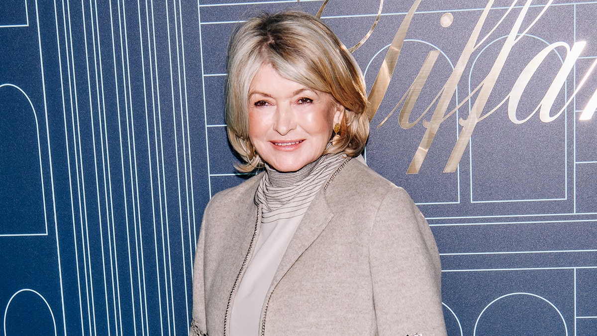 Martha Stewart smiles on red carpet