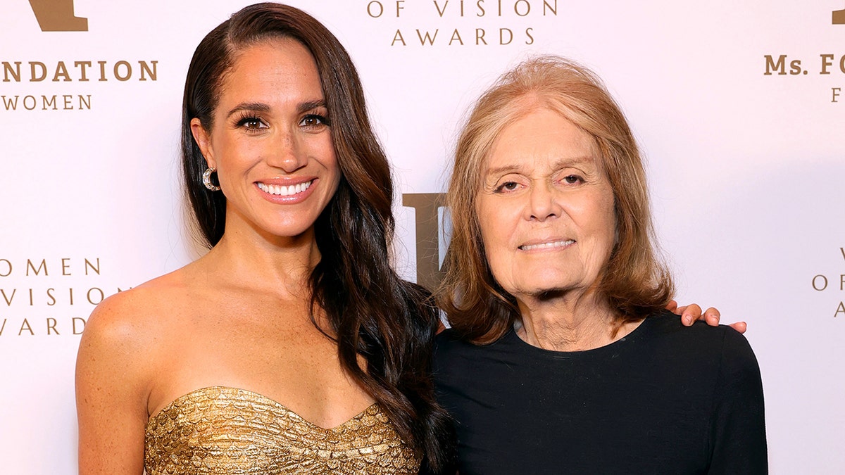 Meghan Markle sparkles in gold dress, Gloria Steinem wears black shirt for foundation event in New York