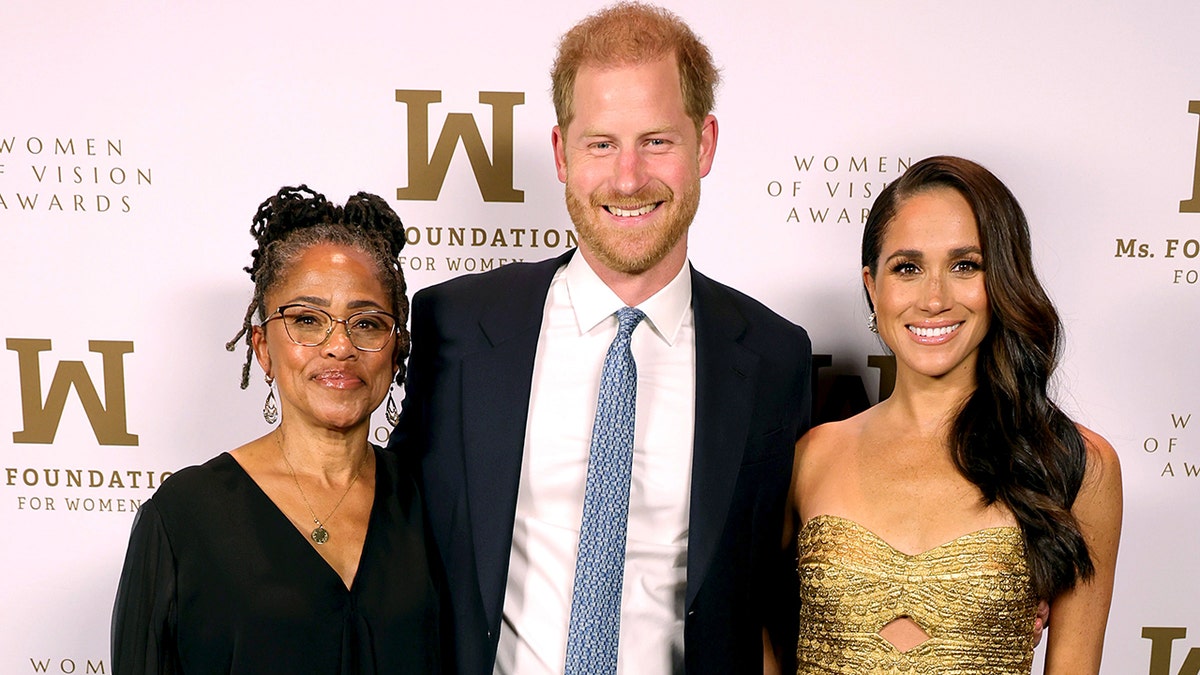 Dora Ragland wears black dress with Meghan Markle and Prince Harry at women foundation event