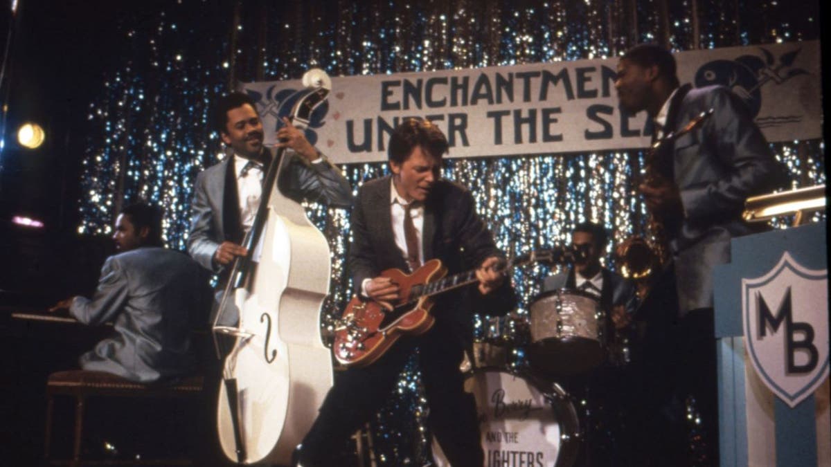 A shot from "Back to the Future" that shows Michael J. Fox's character performing with a band during prom.