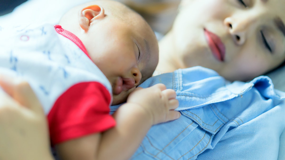 baby and mother sleeping