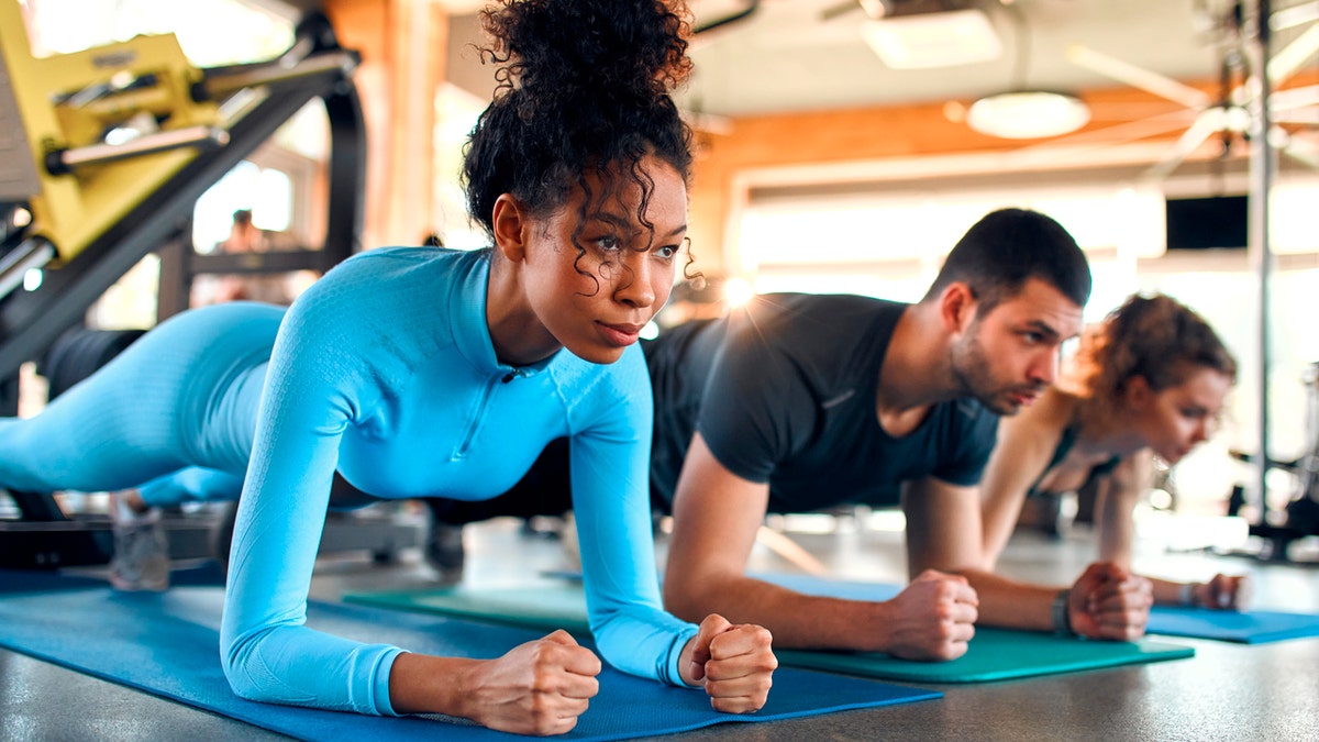 People exercising at gym